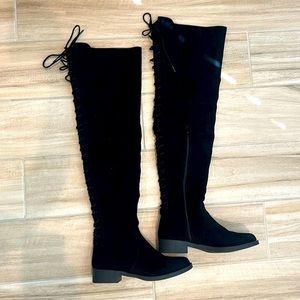 Over the knee lace up boots